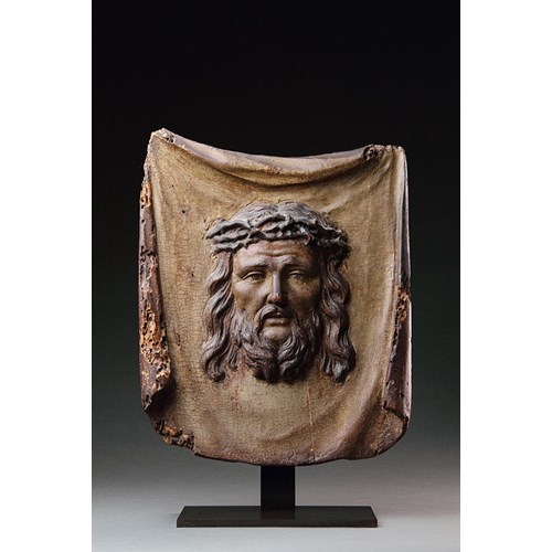 South German Carved Wood Panel Depicting the Image of the Crucified Christ upon a Shroud